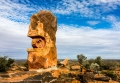 Living Desert Sculptures with Broken Hill in the background
